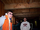 Tyler Stieglitz and Joel Stickling, after successfully claiming a few tables in the lodge get ready to go skiing.