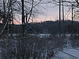 The morning sun paints the sky over Center Lake.