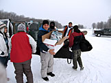 Unloading the vans.  Let's go skiing.  Jon, just don't drop the food.